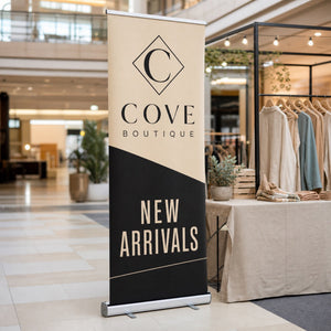 Double-Sided Pull-Up Banner in use - in a shopping centre concourse beside a pop-up stand