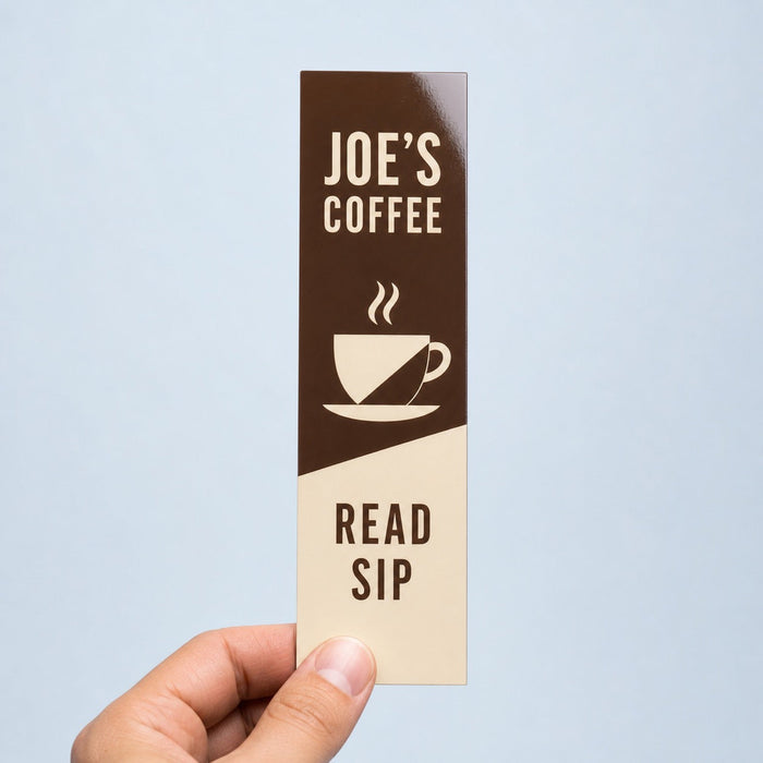 Gloss Laminated Bookmarks held in hand showing its 2 x 6 inches size