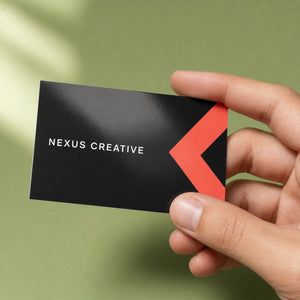 Gloss Laminated Business Cards held in hand showing its 3.5 x 2 inches size