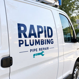 Glossy Adhesive Vinyl in use - on the door panel of a parked work van
