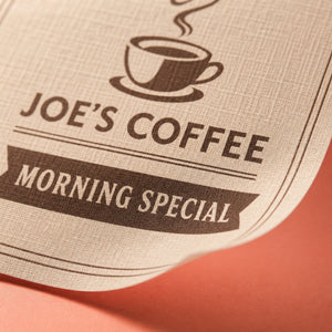 Close-up of the linen-embossed uncoated stock on Linen Flyers