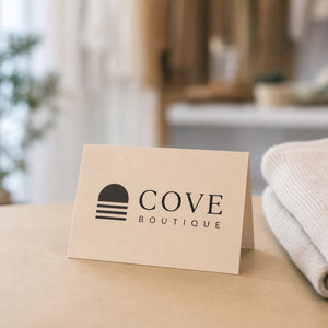Matte Folded Business Cards in use - standing open on a restaurant table beside a menu