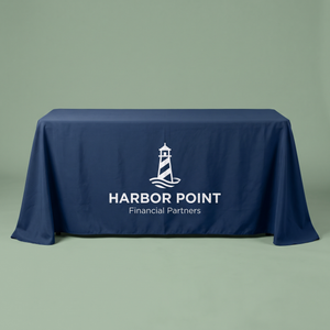 Custom printed table throw draped over a 6 ft folding table, front view