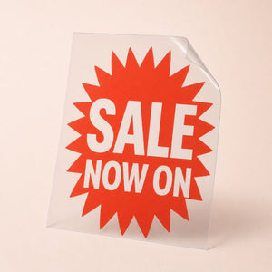 Clear Window Clings printed as a SALE NOW ON promo in bold type on a bright field