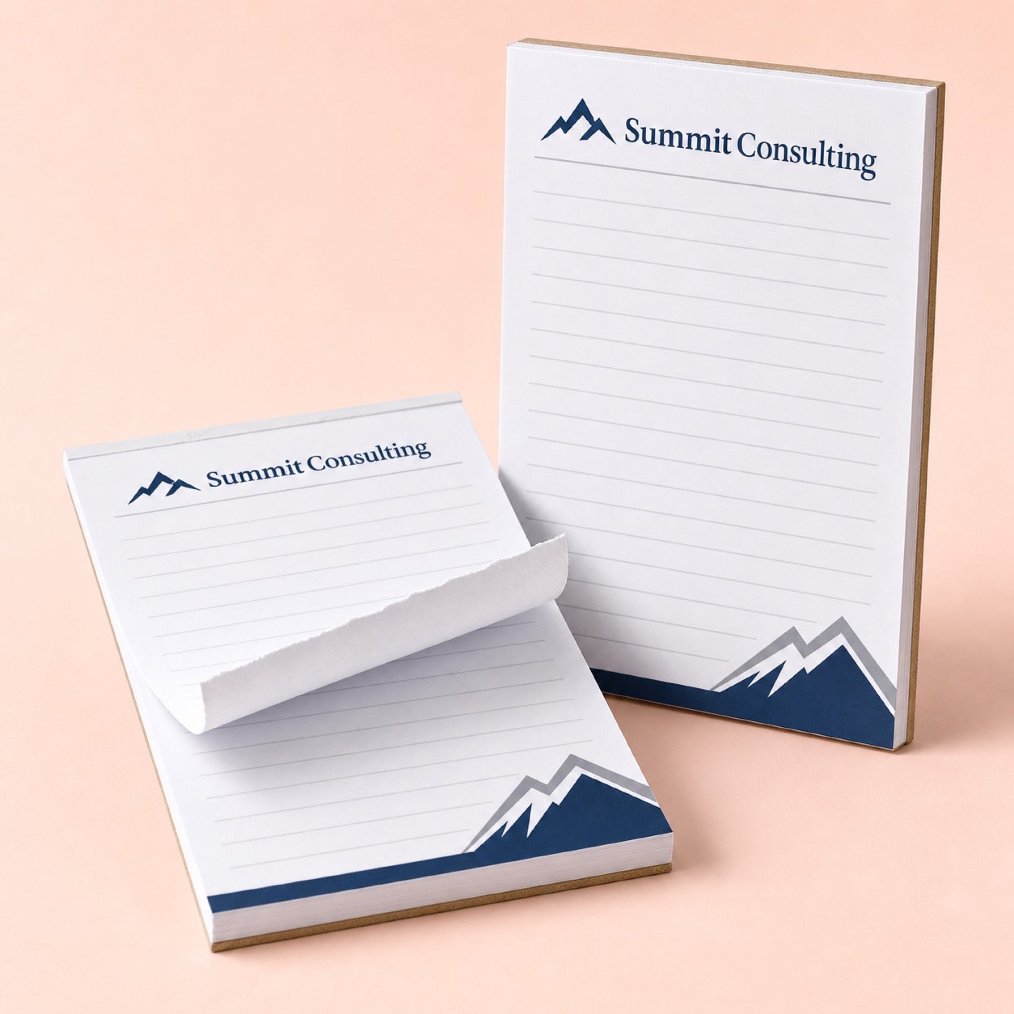 Custom Notepads (50 Pages) printed on 50 sheets of 70lb uncoated text glued to a rigid chipboard backer, 5.5 x 8.5 inches, shown at an angle