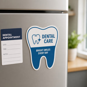 Cut to Shape Magnets 30mil in use - on a fridge beside a dental appointment card