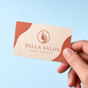 Durable Business Cards held in hand showing its 3.5 x 2 inches size