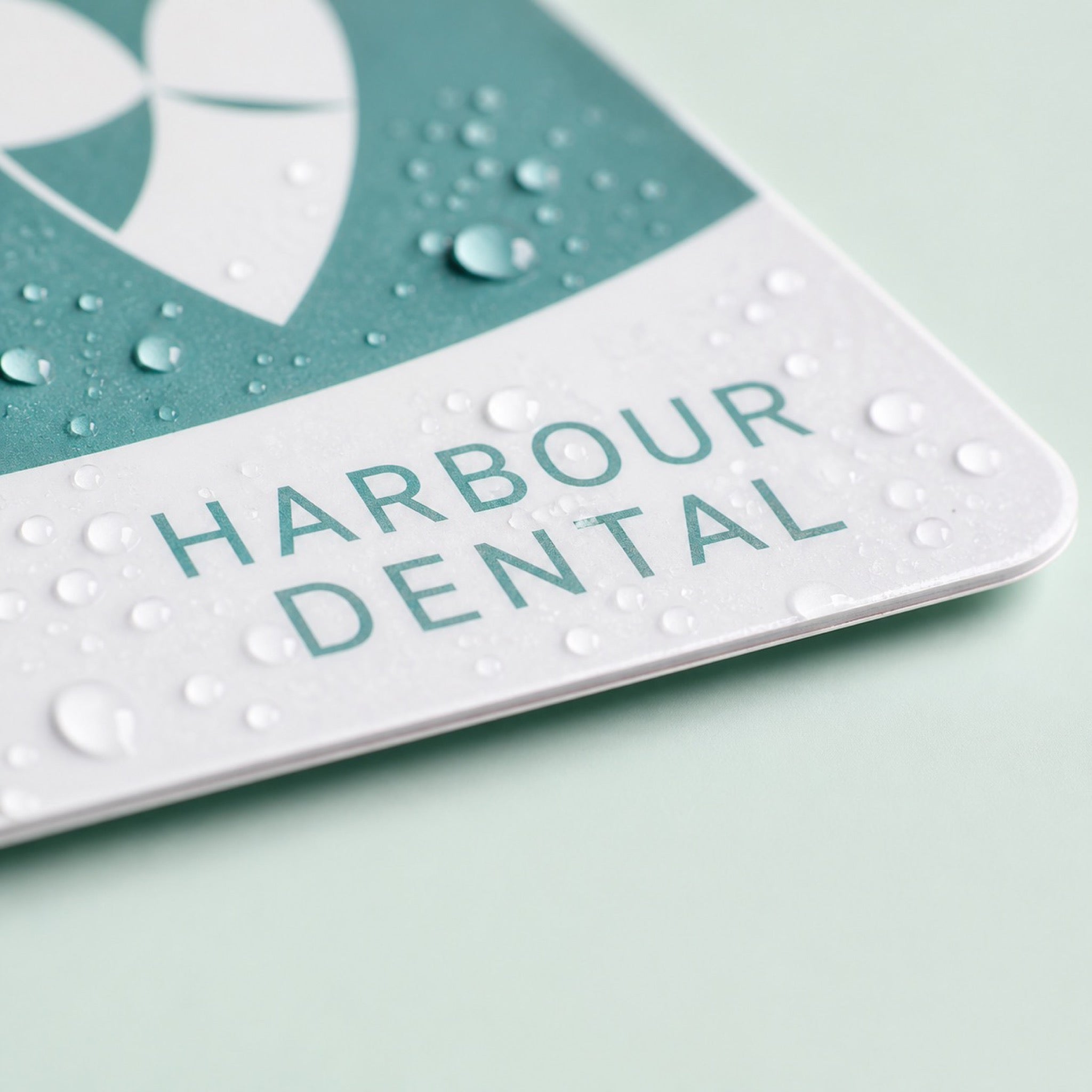 Close-up of the sealed durable laminate on Durable Postcards