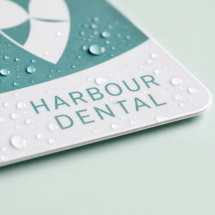 Close-up of the sealed durable laminate on Durable Postcards