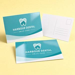 Economy Glossy Postcards printed on 14PT card stock, 4 x 6 inches, shown at an angle