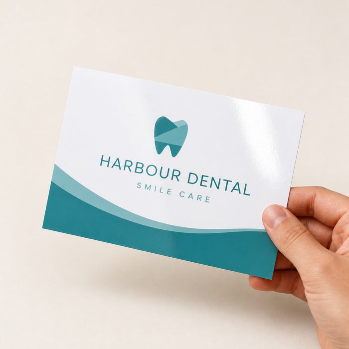 Economy Glossy Postcards held in hand showing its 4 x 6 inches size