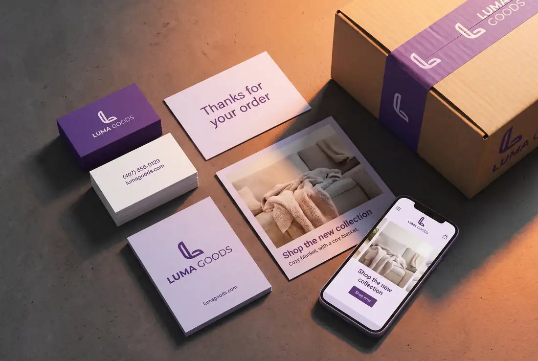 Matching business cards, flyer, door hanger and website on a phone for a sample online store
