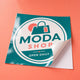 Glossy Adhesive Vinyl printed on self-adhesive calendered vinyl on a paper liner, 12 x 12 inches, shown at an angle