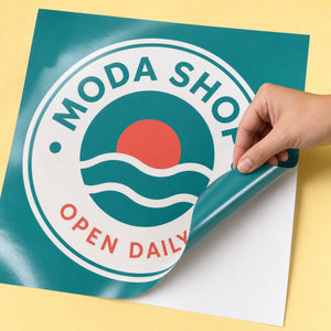 Glossy Adhesive Vinyl held in hand showing its 12 x 12 inches size