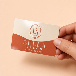 Glossy Business Cards held in hand showing its 3.5 x 2 inches size