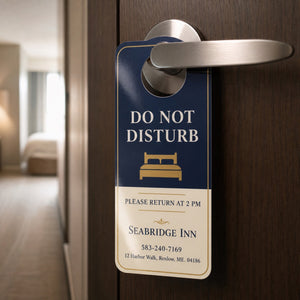 Glossy Door Hangers in use - hanging on a suburban front door beside a parcel on the step