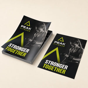 Glossy Flyers printed on 100lb gloss text paper, 8.5 x 11 inches, shown at an angle