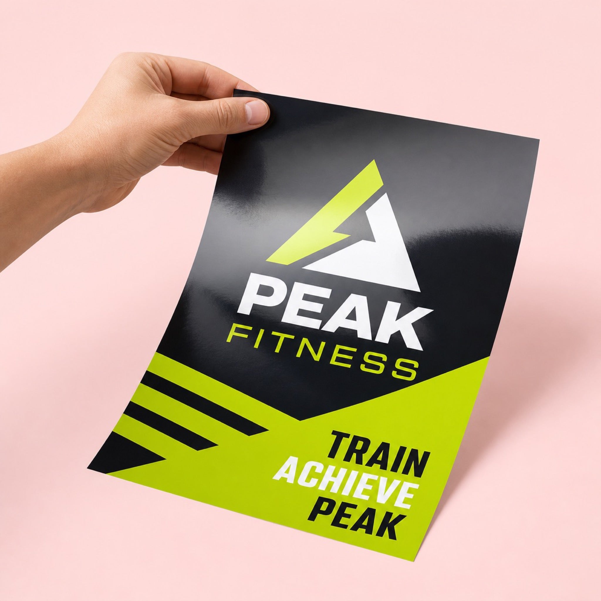 Glossy Flyers held in hand showing its 8.5 x 11 inches size