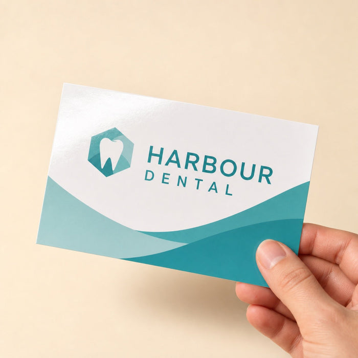 Glossy Postcards held in hand showing its 4 x 6 inches size