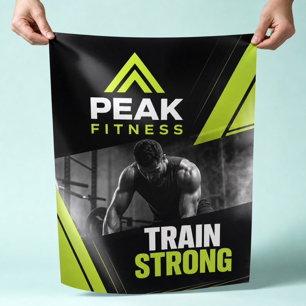 Glossy Posters held in hand showing its 18 x 24 inches size