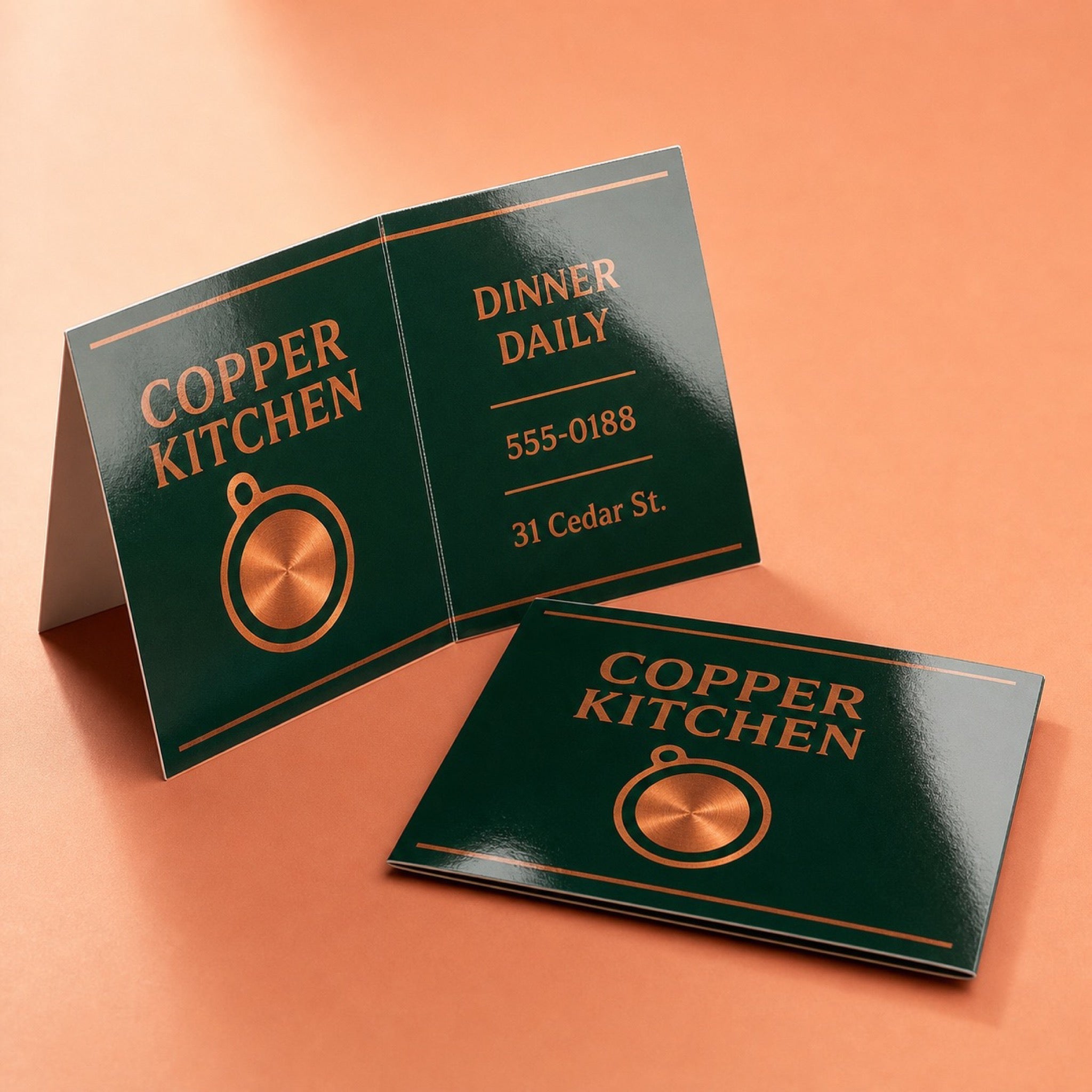 High-Gloss Folded Business Cards printed on 14PT card stock, scored and folded, 3.5 x 4 inches flat, folding down to 3.5 x 2 inches, shown at an angle