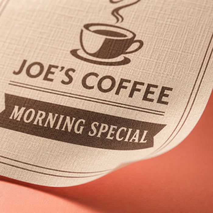 Close-up of the linen-embossed uncoated stock on Linen Flyers