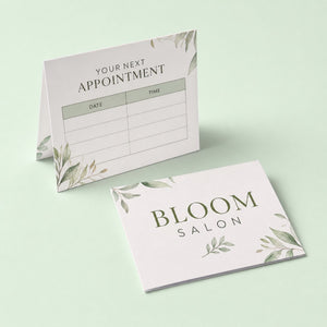 Matte Folded Business Cards printed as a folded appointment card, the salon name outside, a date and time grid inside
