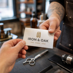 Pearl Business Cards in use - being handed across a workbench in a barber shop