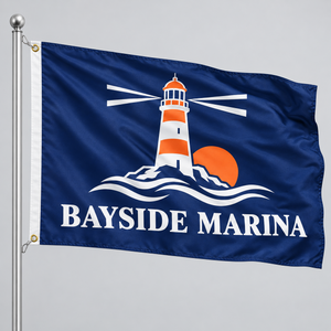 Custom printed pole flag with a white grommet strip and brass grommets clipped to a silver flagpole