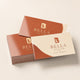 Premium Glossy Business Cards printed on 16PT card stock with gloss AQ coating, 3.5 x 2 inches, shown at an angle