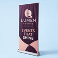 Pull-Up Banner with silver base printed on 13oz blockout banner vinyl in an aluminium retractable cassette, 33 inches wide by 80 inches tall, shown at an angle