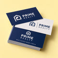 Quick Ship Business Cards printed on 14PT card stock with gloss coating, 3.5 x 2 inches, shown at an angle