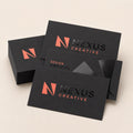 Spot UV Business Cards printed on 16PT card stock, matte laminate with raised spot UV gloss, 3.5 x 2 inches, shown at an angle
