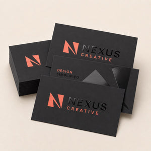 Spot UV Business Cards printed on 16PT card stock, matte laminate with raised spot UV gloss, 3.5 x 2 inches, shown at an angle