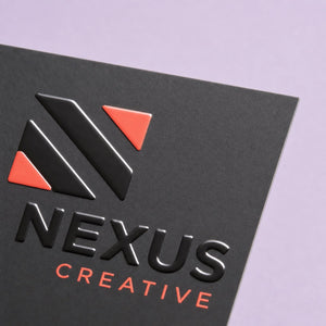 Close-up of the matte laminate with raised spot UV gloss on Spot UV Business Cards