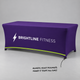 Custom printed stretch table cover on a 6 ft table with elastic foot pockets, purple Brightline Fitness print