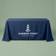Custom printed table throw draped over a 6 ft folding table, front view