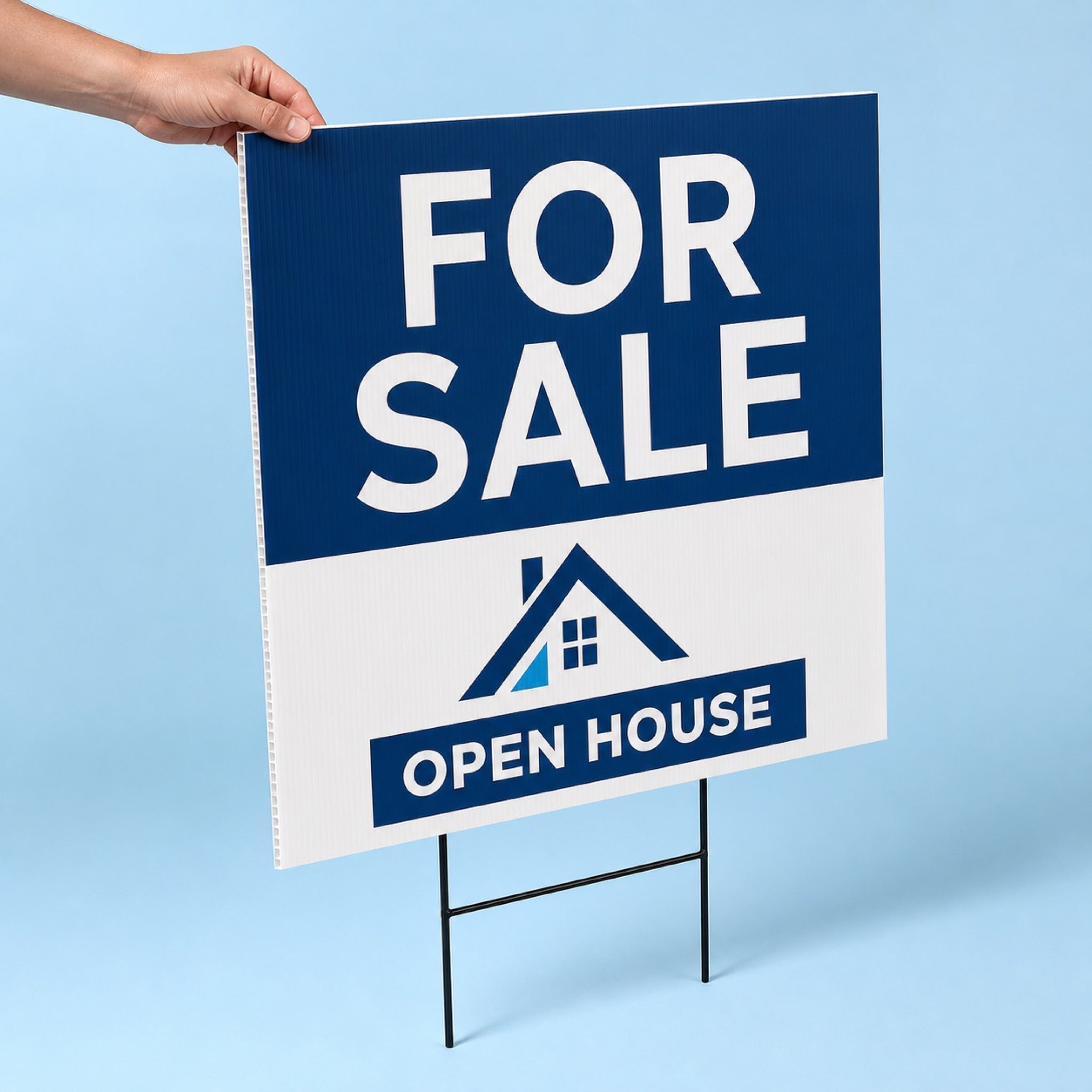 Yard Signs held in hand showing its 24 x 18 inches size